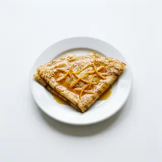 Crep con Gran Marnier flameado de naranja amarga