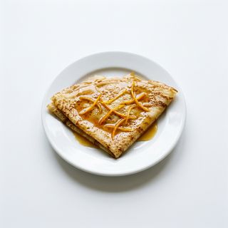 Crep con Gran Marnier flameado de naranja amarga