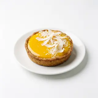 Tarta de mango y coco