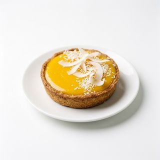 Tarta de mango y coco