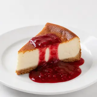 Tarta de queso casera con mermelada de frambuesa