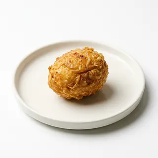 Huevo cocido frito