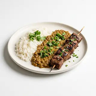 Arroz Con Menestra Y Chuzo