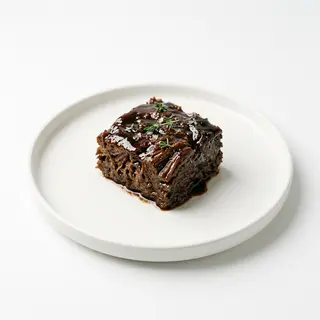 Brownie de bou amb salsa d'oporto