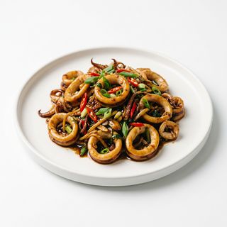 Calamares estilo chino en fuente quemada