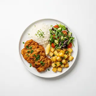 Chuletas De Ternera Apanado Con Arroz, Ensalada Y Patatas