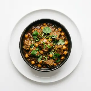 Cordero Balti con Garbanzos