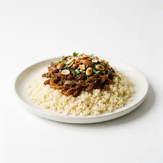 Cous Cous De Cebolla Caramelizada Pasas Y Frutos Secos