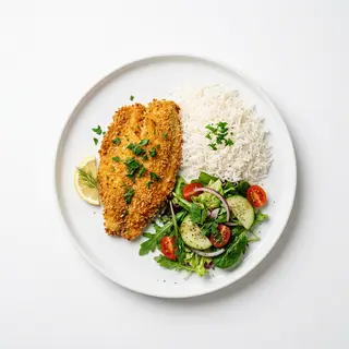 Filete De Tilapia Apanado Con Arroz Y Ensalada