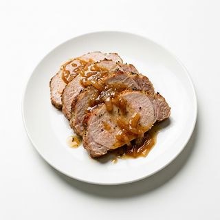 Lomo de Cerdo con Salsa Cebolla