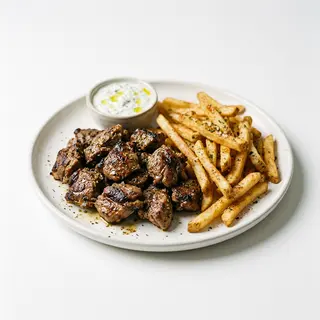 Plato kebab de cordero con patatas