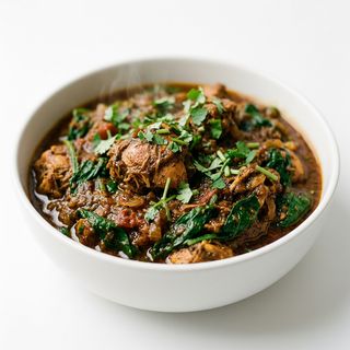 Pollo balti con espinacas