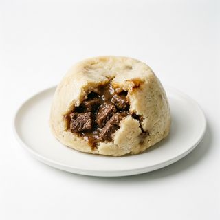 Pudín De Sebo Con Carne (Porción)