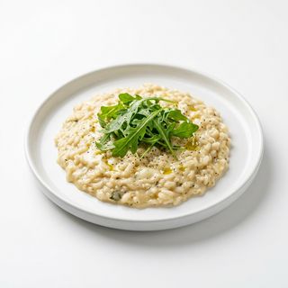 Risotto 5 formaggi con rúcula