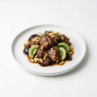 Tajine De Cordero Ciruelas Kiwi Almendras