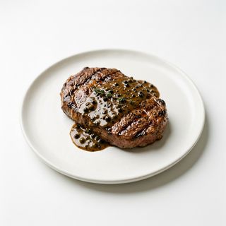 51 - Ternera a la plancha con salsa de pimienta