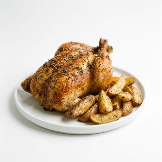 Pollo Entero Con Patatas