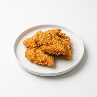 1/2 Ración De Pechuga De Pollo Empanado