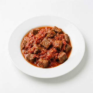 Carne Con Tomate