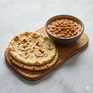 Curry de garbanzos con panes frito (2 uds.) 