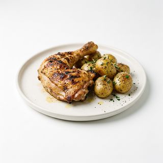 Pollo a la brasa con patatas baby aliñadas