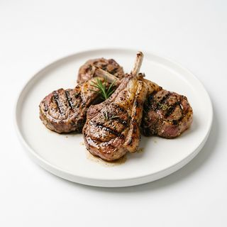 Chuletas de cordero ½ ración