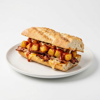 Bocadillo Bravas Con Bacon Y Queso