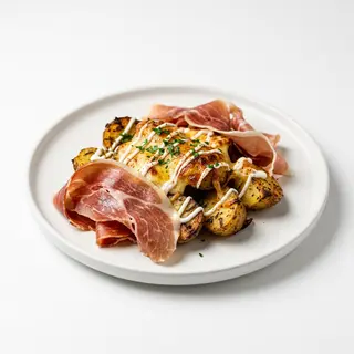 Plato De Prosciutto Con Patatas Y Jamón