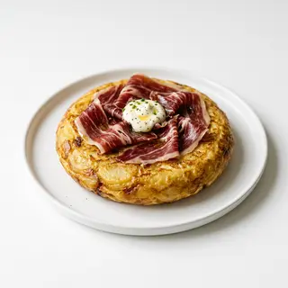 Tortilla de jamón ibérico con alioli