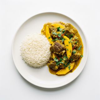 Curry De Cordero Con Mango