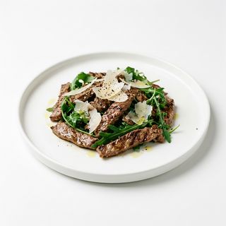 Straccetti con rucola e grana