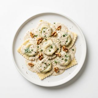 Ravioli con ricotta, spinaci e crema di noci