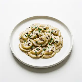 Mezzelune de ricotta y boletus