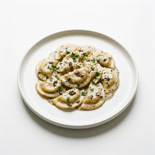 Mezzelune de ricotta y boletus