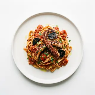 Tagliatella Arrabiata de pulpo (1.3.4.9)
