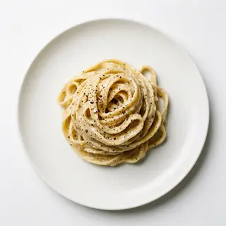 Tagliatelle a la salsa cacio e pepe
