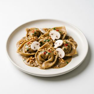 Torteloni Con Crema De Boletus