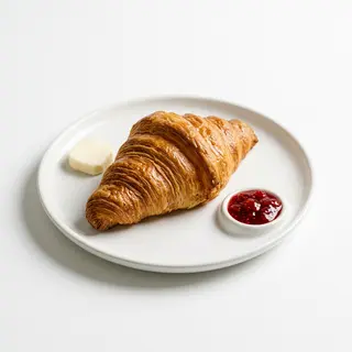Croissant con mermelada y mantequilla