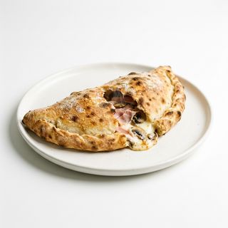 Calzone al prosciutto e funghi
