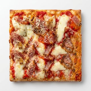 Pizza amatriciana porción