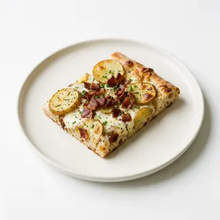 Pizza De Patata Y Bacon (Porción)