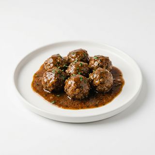 Ración De Albóndigas En Salsa