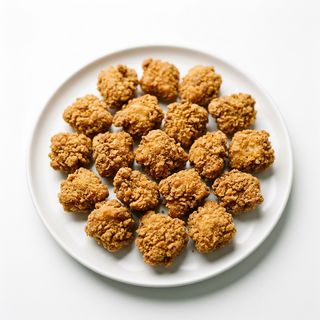 16. Delicias De Pollo (Ración)