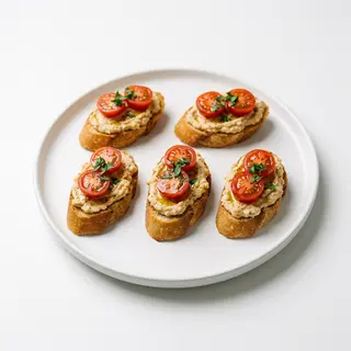 Ración De Montadito De Hummus Con Tomate Cherry