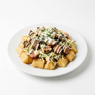 Yuca Con Carne Asada Mixta