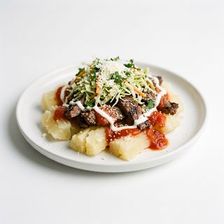 Yuca Con Carne Asada De Ternera