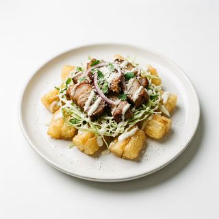 Yuca Con Carne Asada De Cerdo