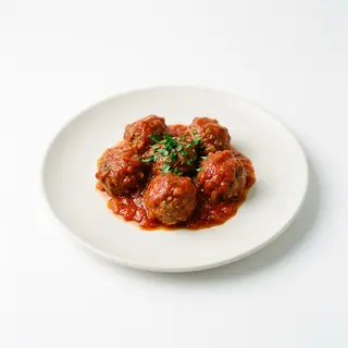 Ración De Albóndigas Con Tomate