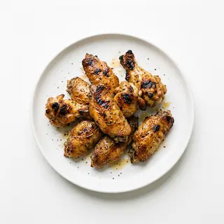 Alitas asadas de pollo de corral (250 g.)