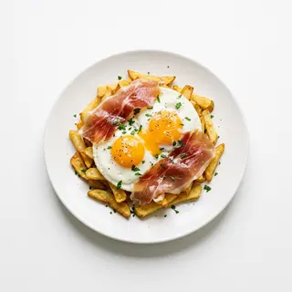 Huevos Rotos Con Jamón De Bodega (Ración)